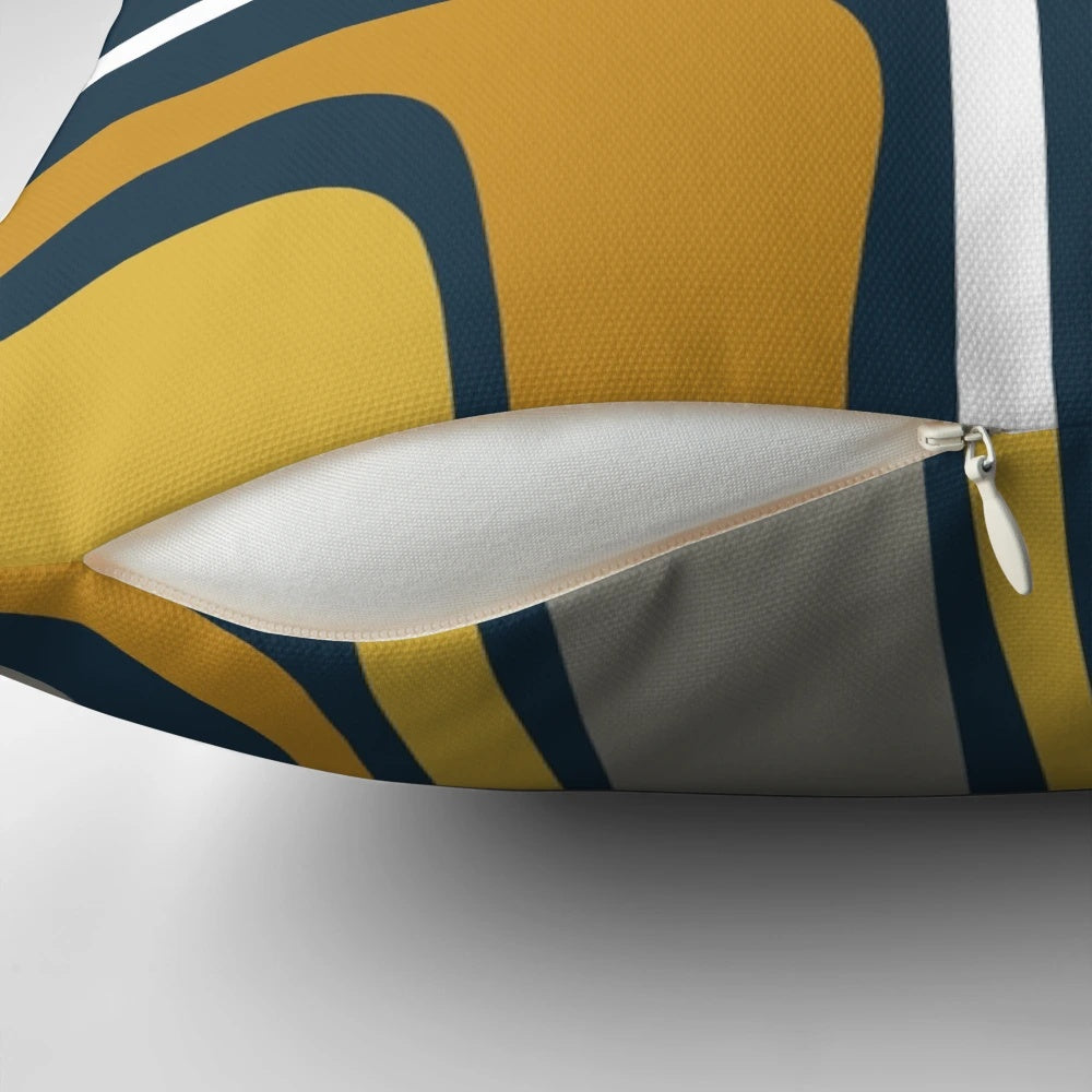Mid-century modern abstract pattern in light and dark mustard, gray, and white on navy blue pillow