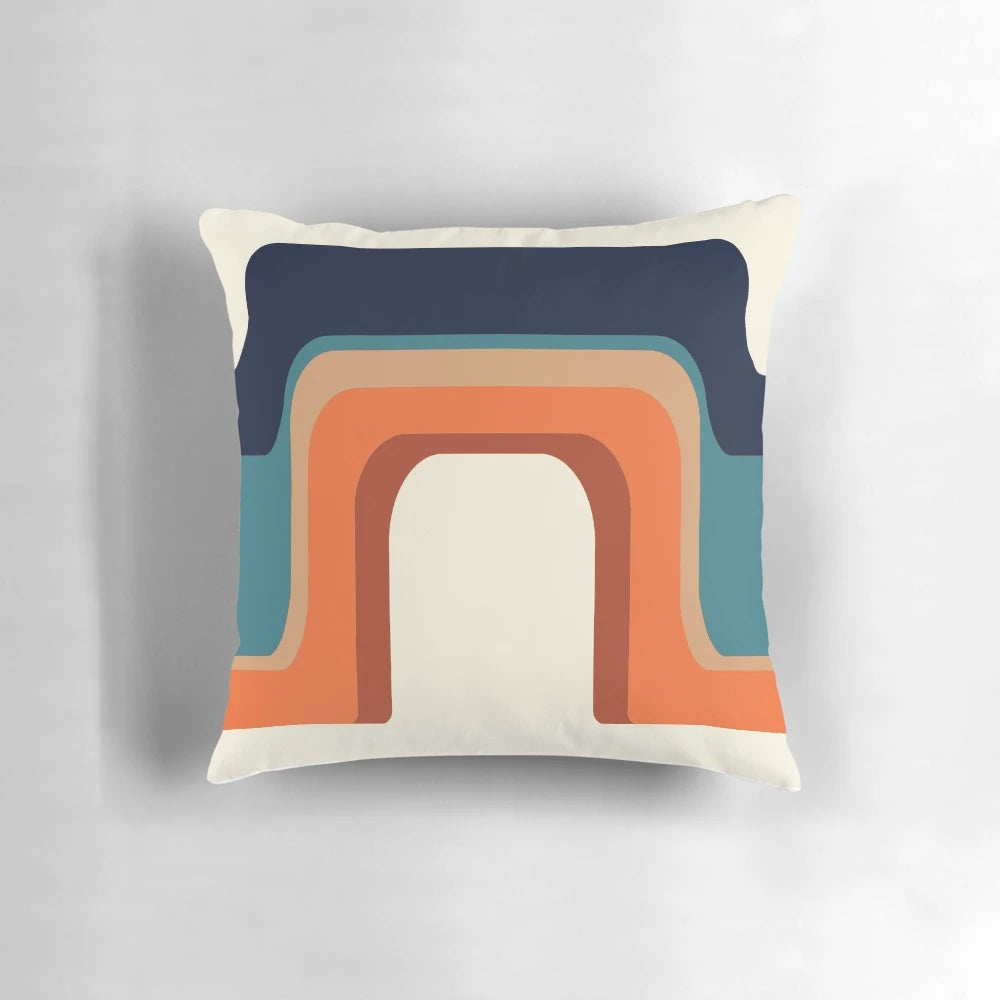 Vibrant midcentury modern rainbow pillow with 1970s-inspired design