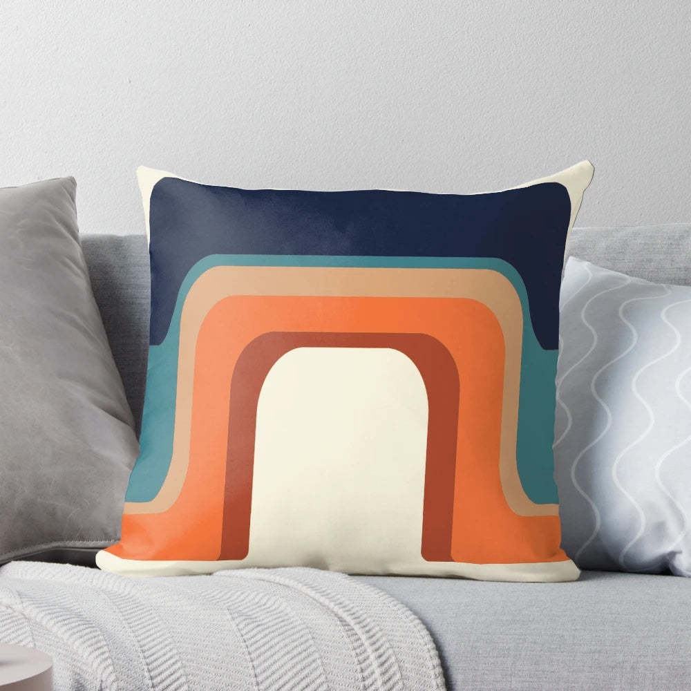 Vibrant midcentury modern rainbow pillow with 1970s-inspired design