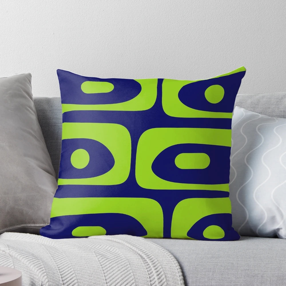 Mid century modern decorative pillow with abstract navy blue and lime green pattern