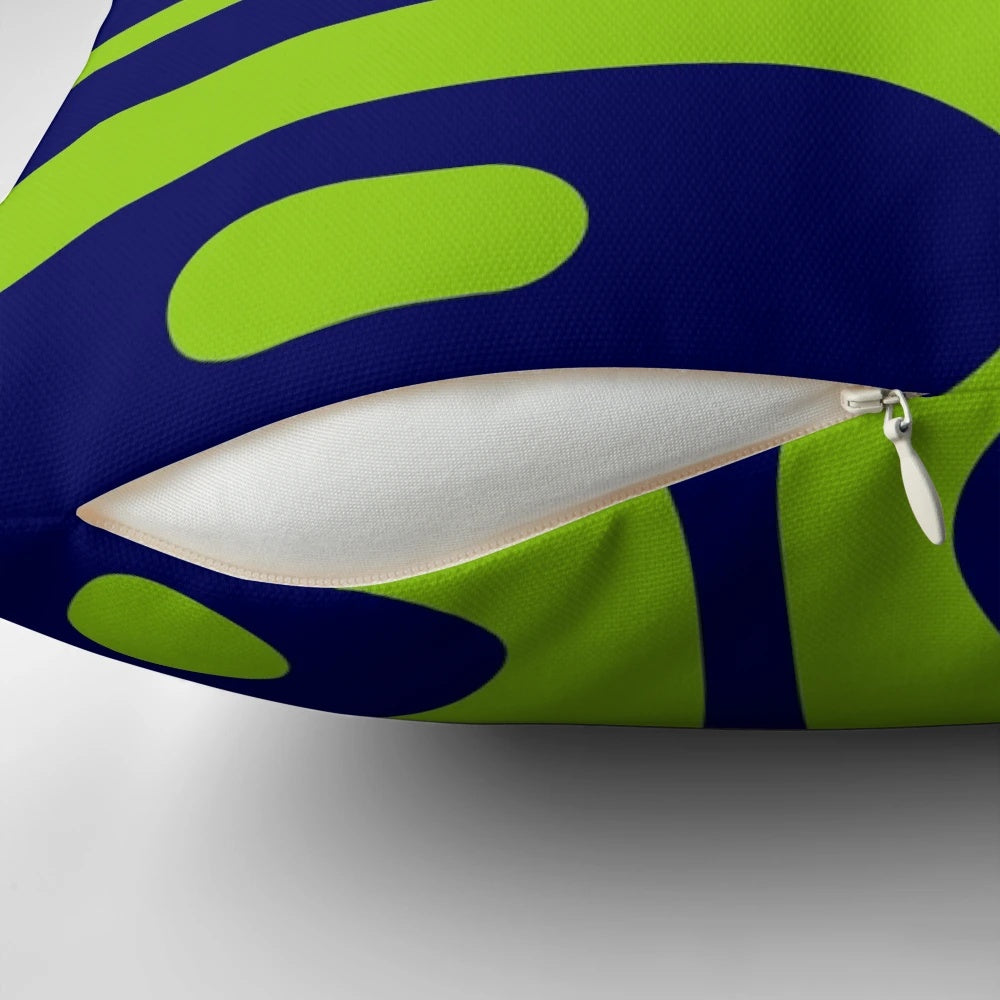 Mid century modern decorative pillow with abstract navy blue and lime green pattern