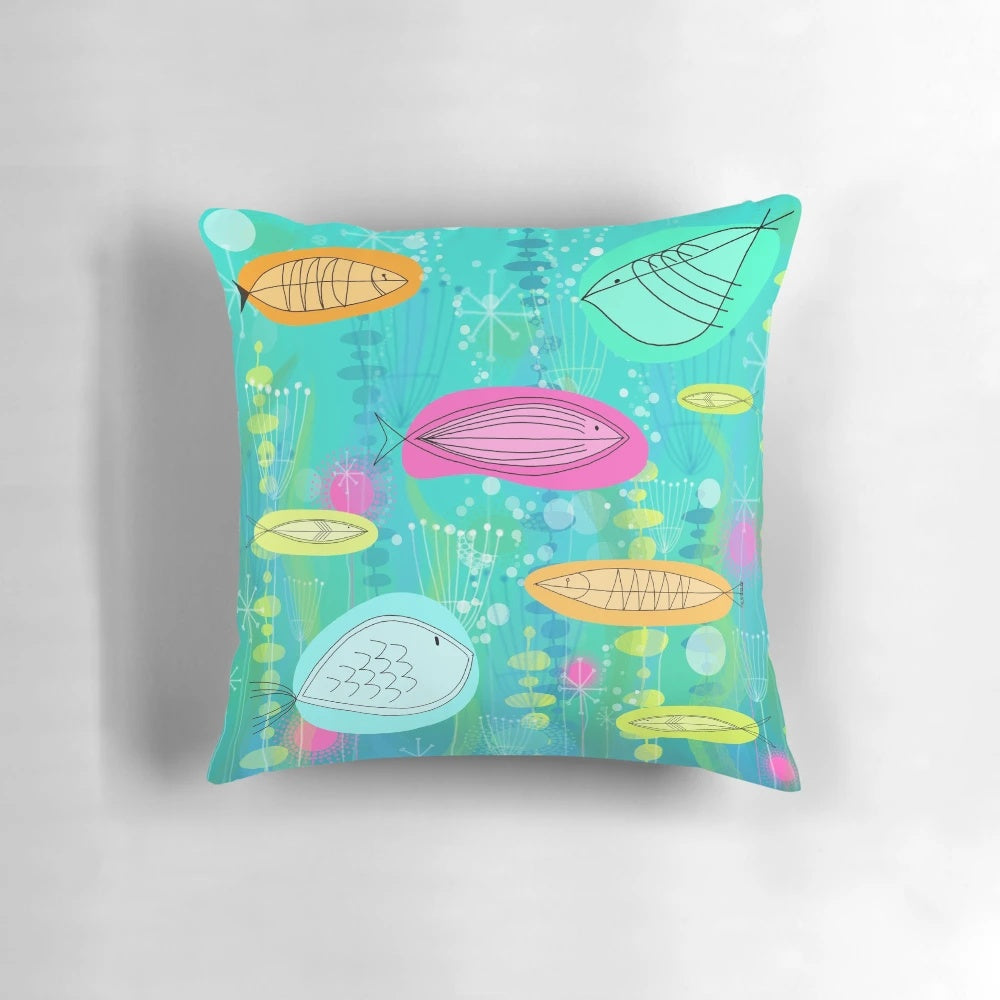 Midcentury-inspired throw pillow featuring a vibrant fish design in shades of blue and white