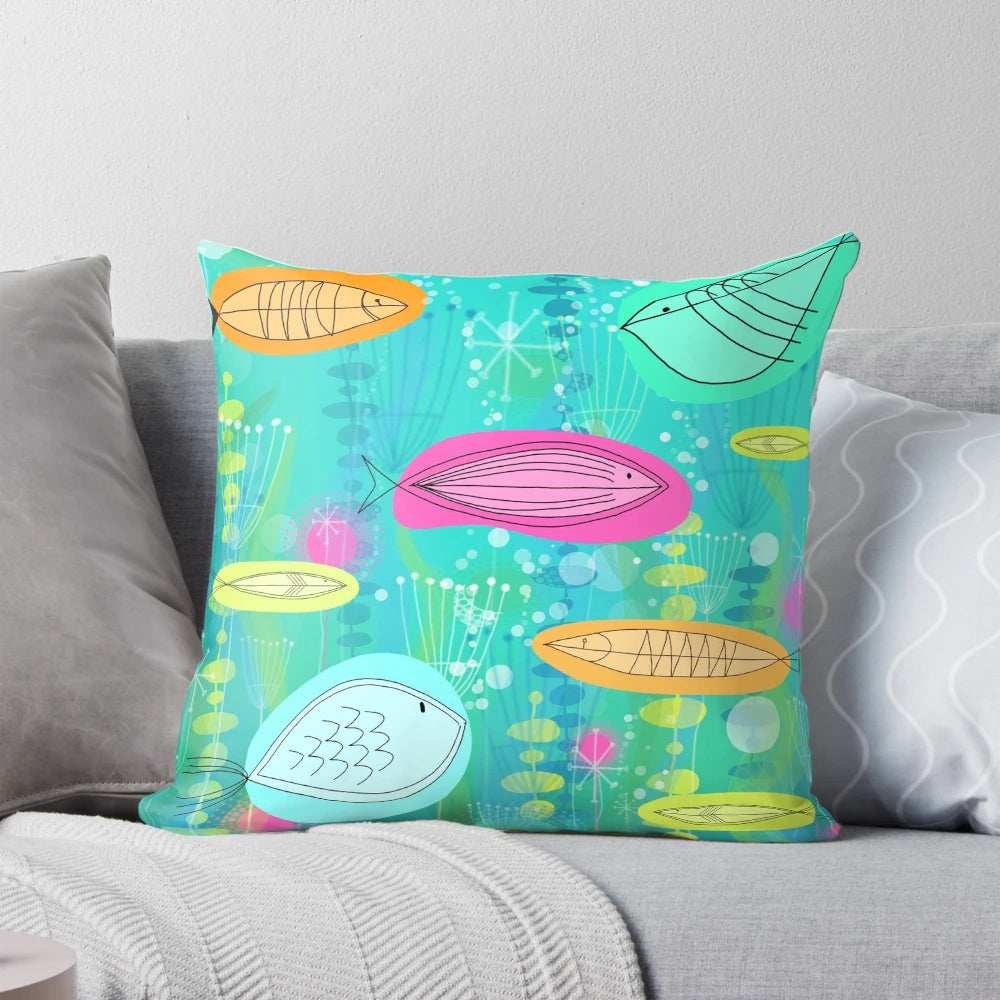 Midcentury-inspired throw pillow featuring a vibrant fish design in shades of blue and white