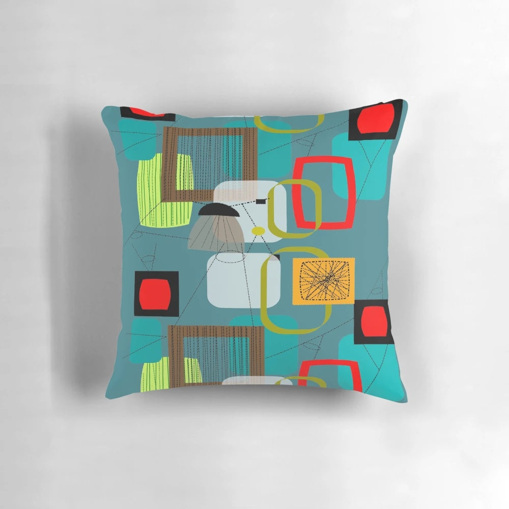 Midcentury modern abstract art inspired pillow with atomic and space age design