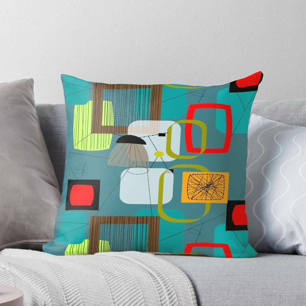Midcentury modern abstract art inspired pillow with atomic and space age design