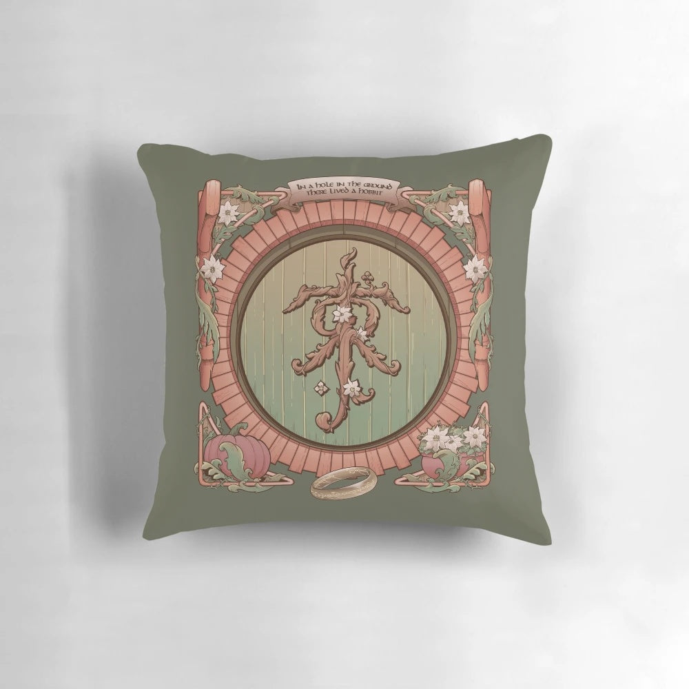 A plush, decorative pillow featuring a cozy hobbit hole design, inspired by the world of J.R.R. Tolkien's Lord of the Rings and The Hobbit.