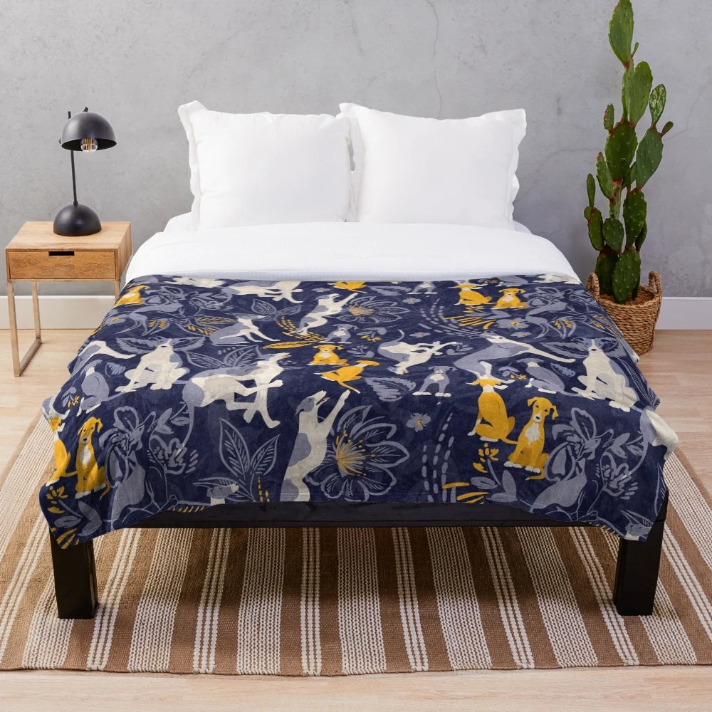 Greyhound pattern plush blanket in midnight blue and yellow colors