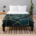 Midnight green and gold geometric plush blanket