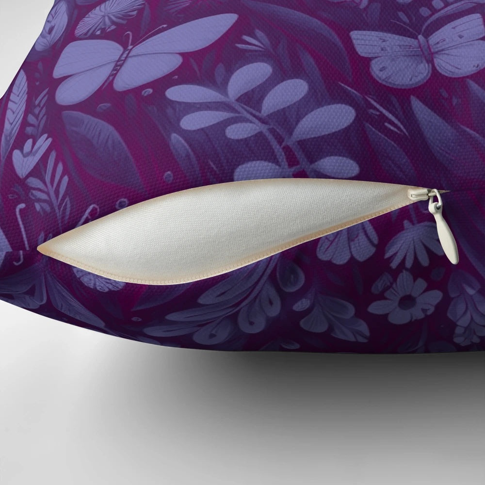 Decorative midnight blue and purple pillow with a field of butterflies against a starry night sky