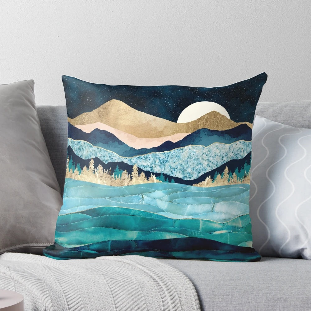 Midnight Ocean Pillow - Plush, decorative pillow featuring a celestial-inspired design with moons, stars, and mountains in shades of indigo, gold, and pink.
