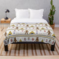 Midsommar-inspired plush blanket with a floral pattern