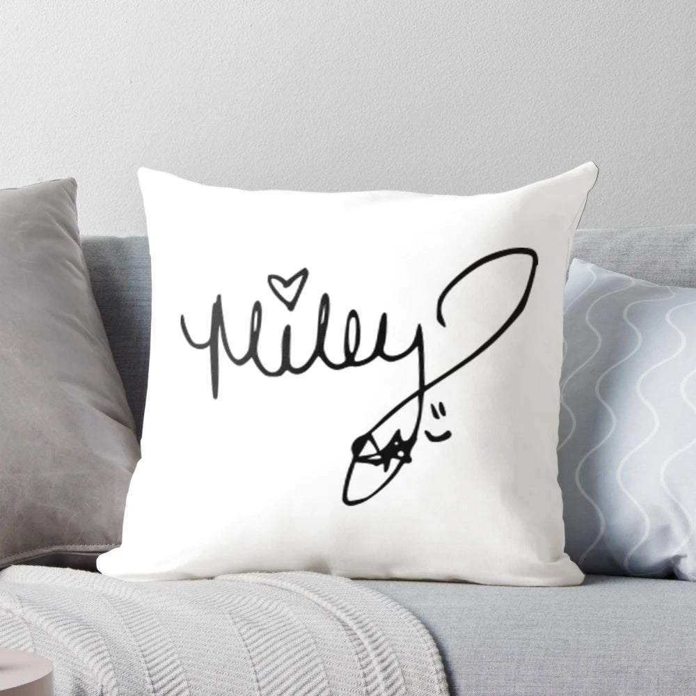 Miley Cyrus autographed throw pillow with her signature