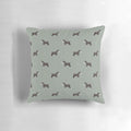 Side-facing Schnauzer dog breed pattern printed on a sage green decorative pillow
