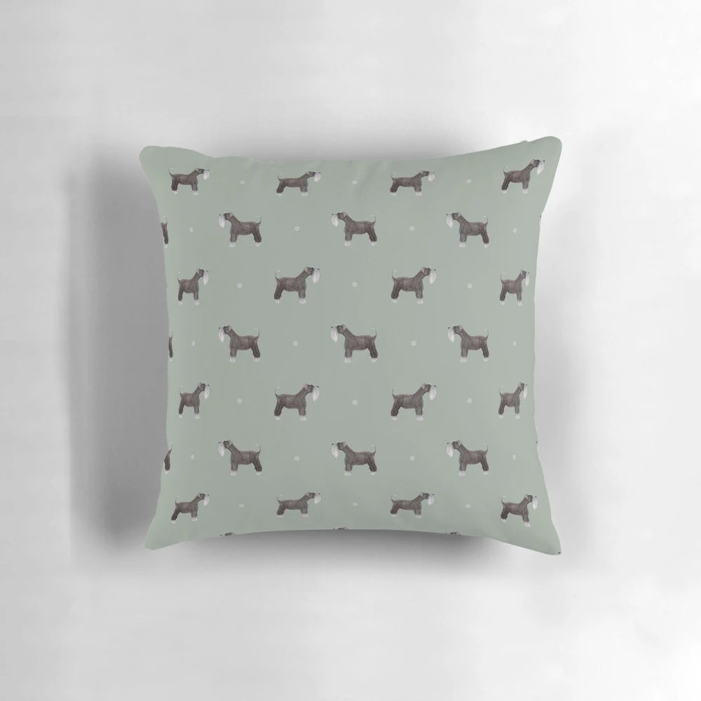 Side-facing Schnauzer dog breed pattern printed on a sage green decorative pillow