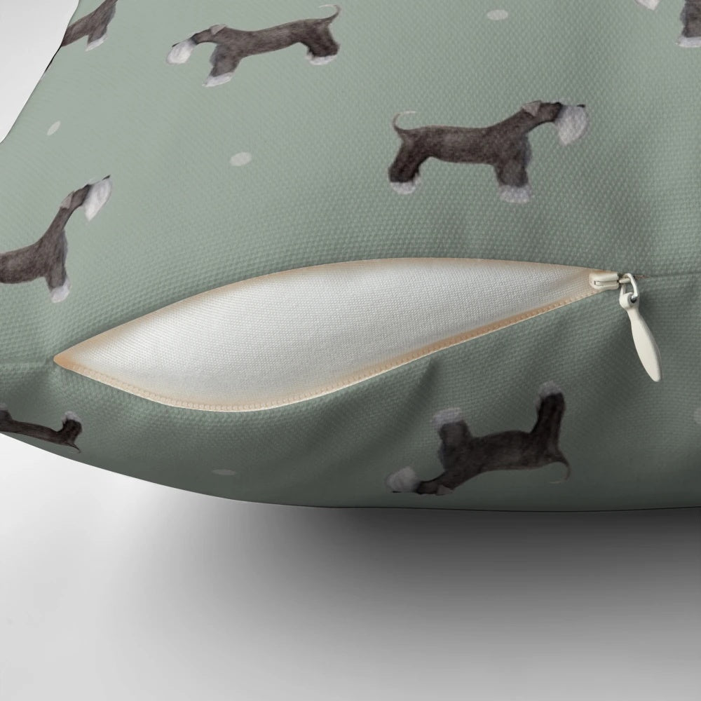 Side-facing Schnauzer dog breed pattern printed on a sage green decorative pillow
