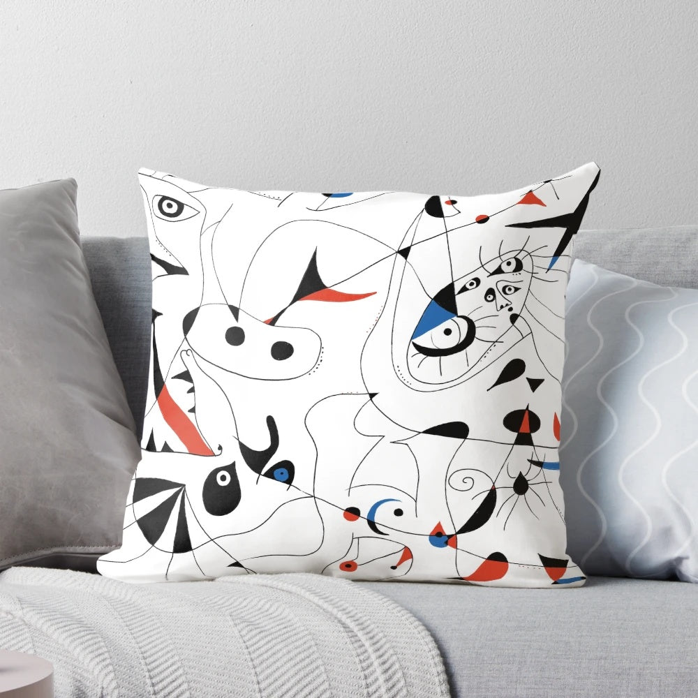 Minimalist abstract art pillow with black lines and shapes, inspired by the artwork of famous 20th century painter Joan Miró.