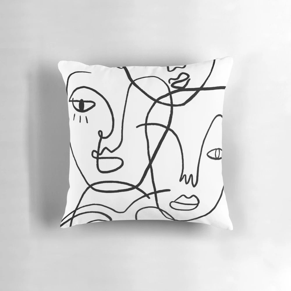 Minimalist abstract faces pillow with continuous line drawings