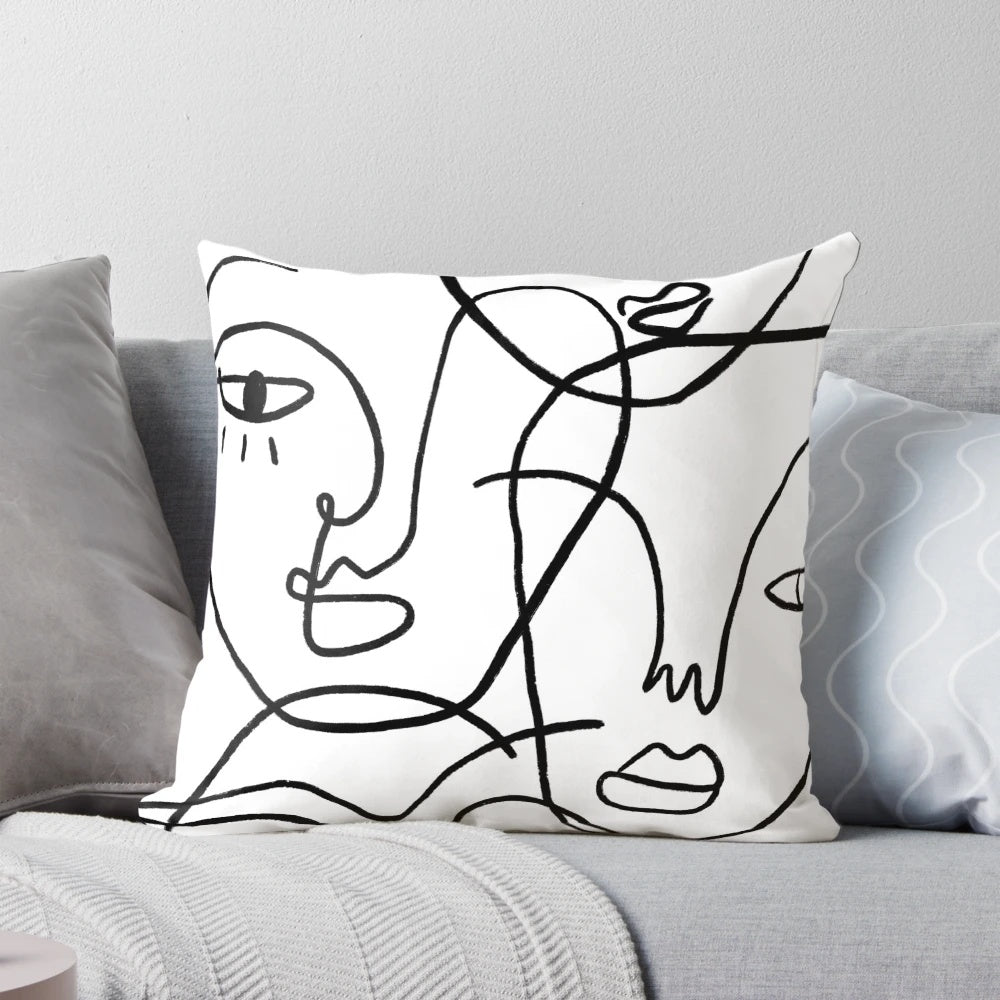Minimalist abstract faces pillow with continuous line drawings