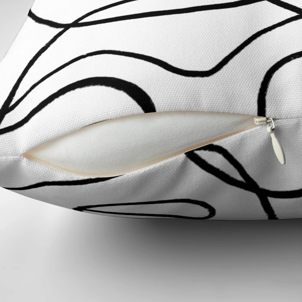 Minimalist abstract faces pillow with continuous line drawings
