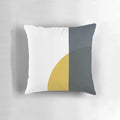 Minimalist abstract geometric pattern pillow in navy blue, light mustard yellow, and white colors
