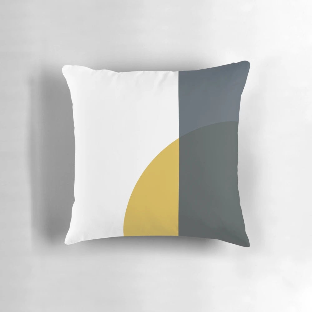 Minimalist abstract geometric pattern pillow in navy blue, light mustard yellow, and white colors