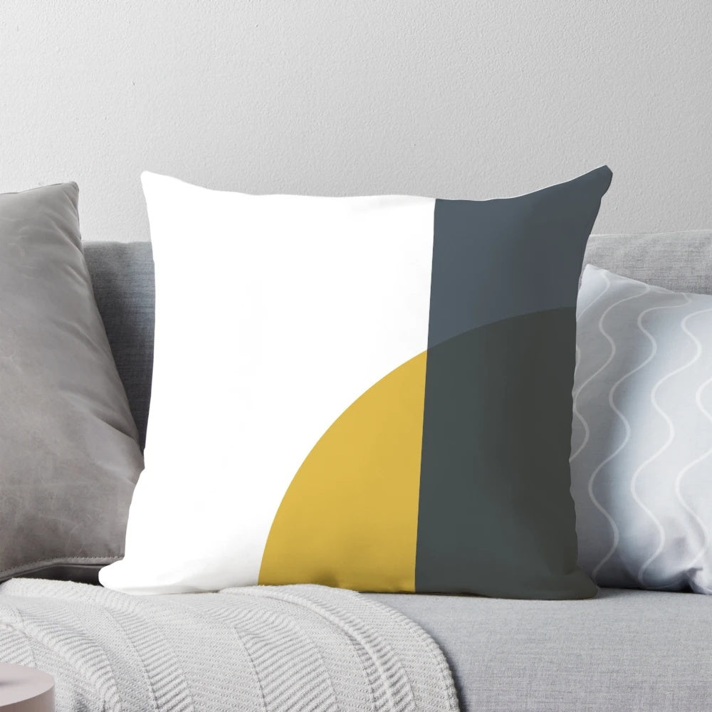 Minimalist abstract geometric pattern pillow in navy blue, light mustard yellow, and white colors