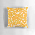 Minimalist abstract pattern pillow in a vibrant mustard yellow and white color scheme