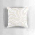 A modern abstract swirl pattern in light beige and white colors on a minimalist decorative pillow.