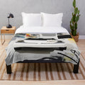Plush blanket featuring a minimalist oil painting design of a classic car