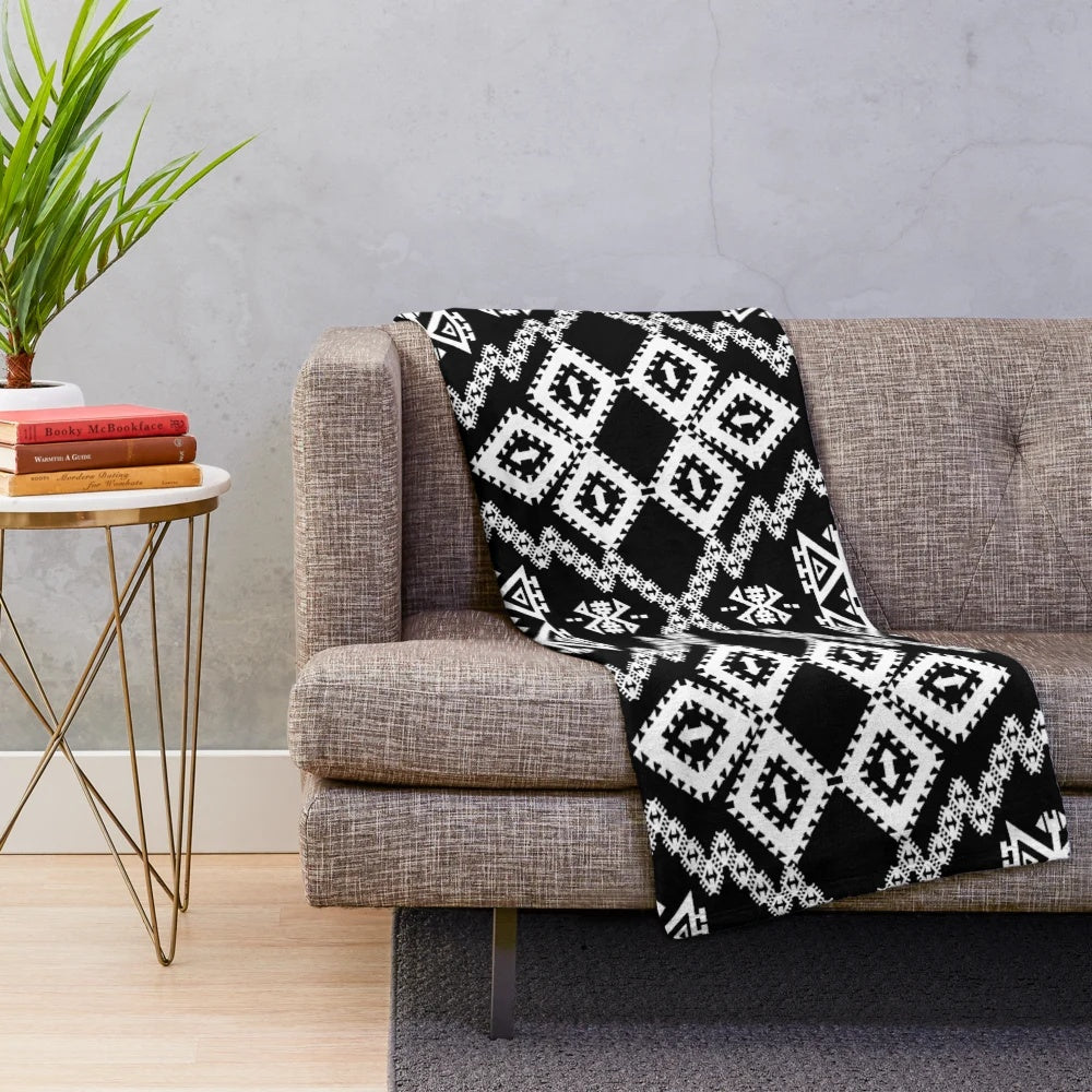 Monochrome geometric Aztec-inspired plush blanket