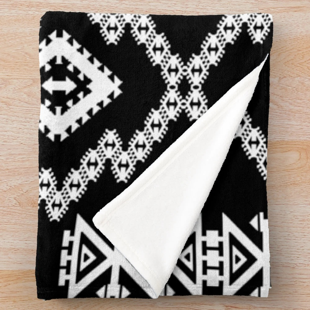 Monochrome geometric Aztec-inspired plush blanket