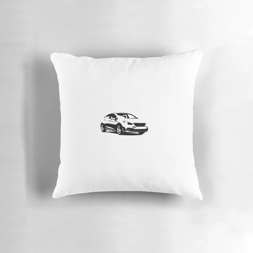 A modern, minimalist white pillow with a black car silhouette design, perfect for automotive-inspired home decor.