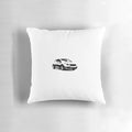 A modern, minimalist white pillow with a black car silhouette design, perfect for automotive-inspired home decor.