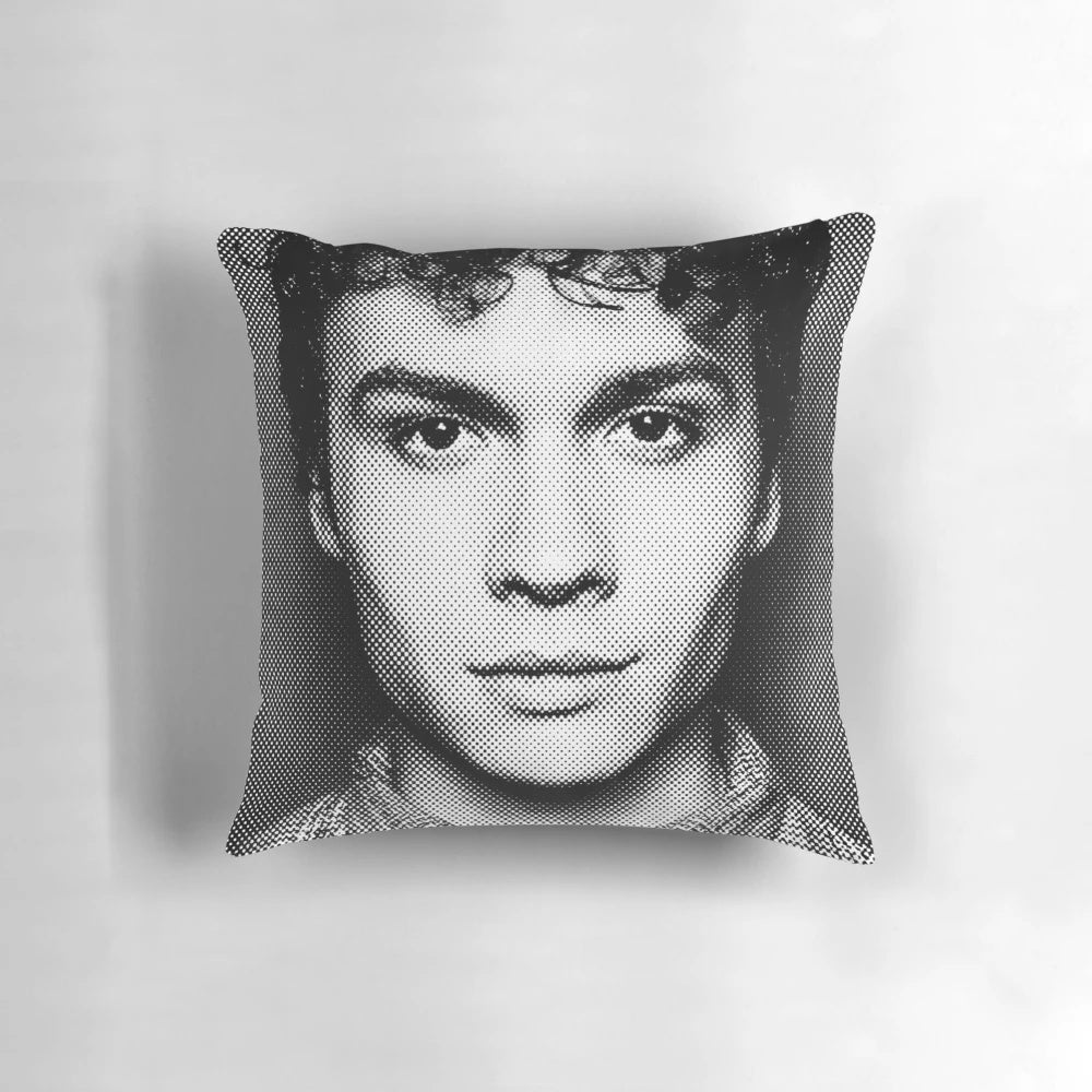 Stylish black and white portrait pillow featuring a smiling face in a pointillism style by artist Benjamin Wadsworth.