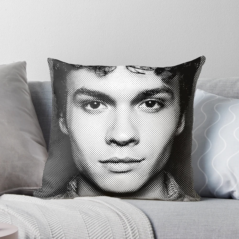Stylish black and white portrait pillow featuring a smiling face in a pointillism style by artist Benjamin Wadsworth.