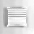 Minimalist black and white striped pillow with a geometric, vector pattern design