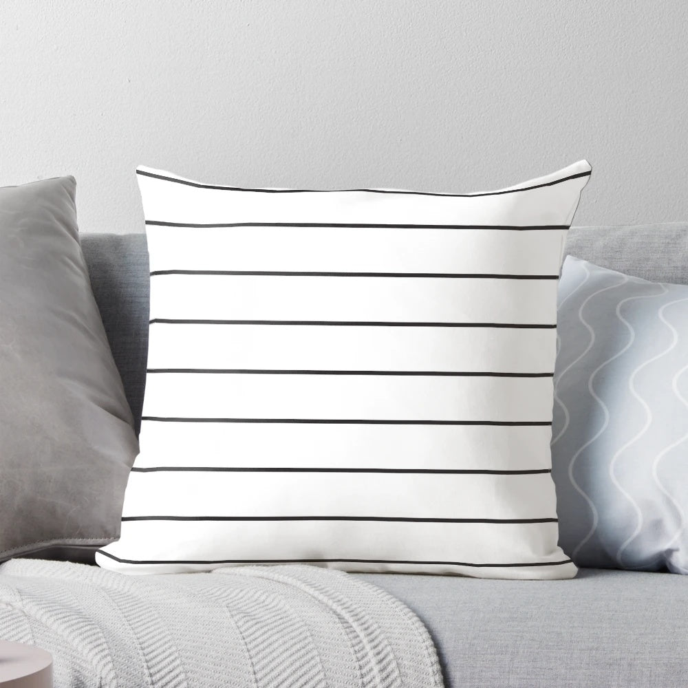 Minimalist black and white striped pillow with a geometric, vector pattern design