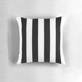 Minimalist modern black and white striped pillow with a simple line pattern design