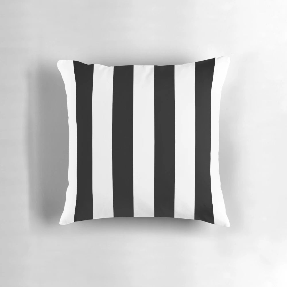 Minimalist modern black and white striped pillow with a simple line pattern design