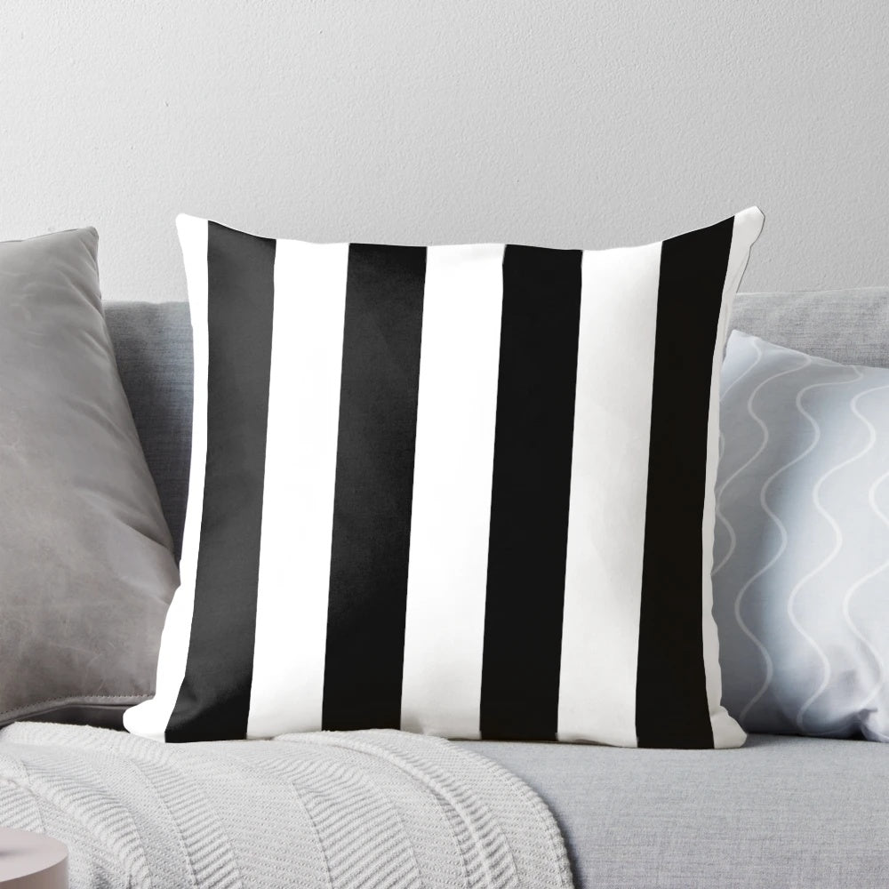 Minimalist modern black and white striped pillow with a simple line pattern design