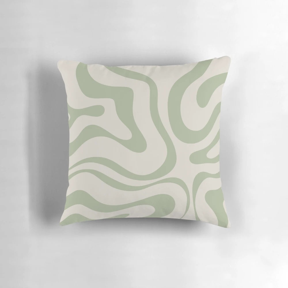 Minimalist abstract swirl pattern pillow in beige and sage green colors