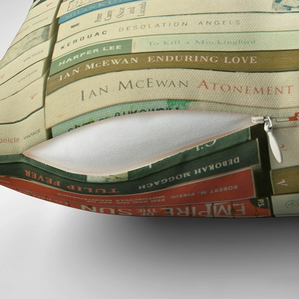 Decorative pillow featuring an abstract stack of book spines in a minimalist, modern design