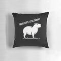 A black and white minimalist illustration of a serene capybara on a peaceful pillow design.