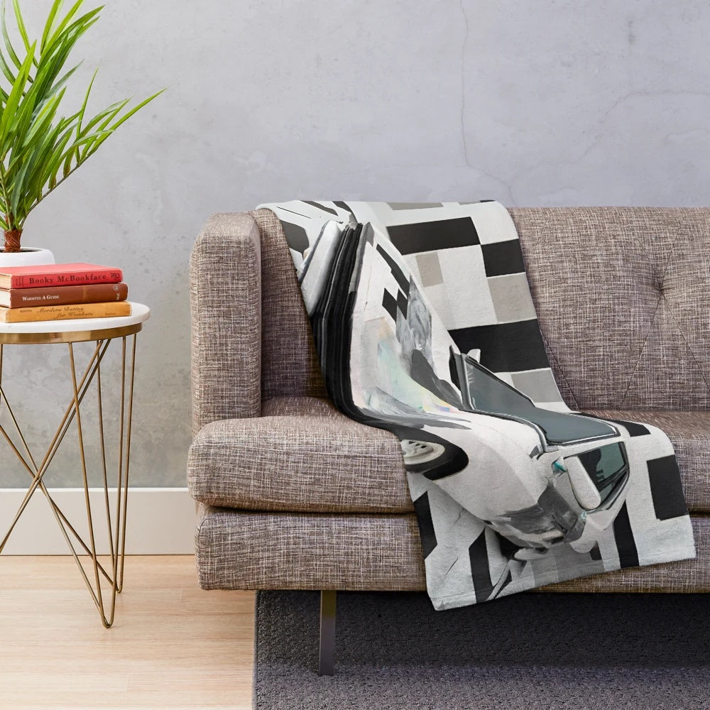 Minimalist car art design on a plush blanket