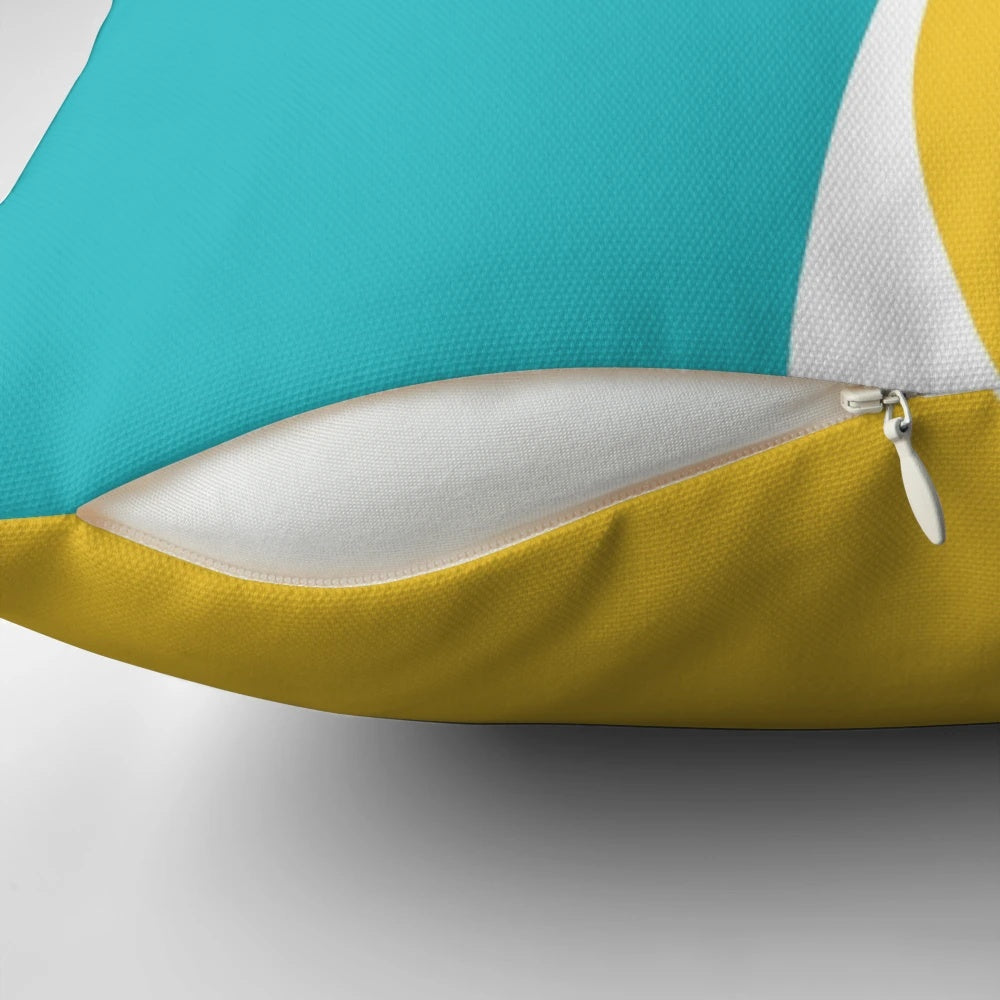 Soft, simple waves pillow in soothing turquoise and vibrant yellow color palette for a chic coastal vibe.