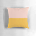 Minimalist color block pillow in soft blush pink and mustard yellow hues