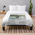 Minimalist Bigfoot plush blanket with a paranormal, supernatural aesthetic
