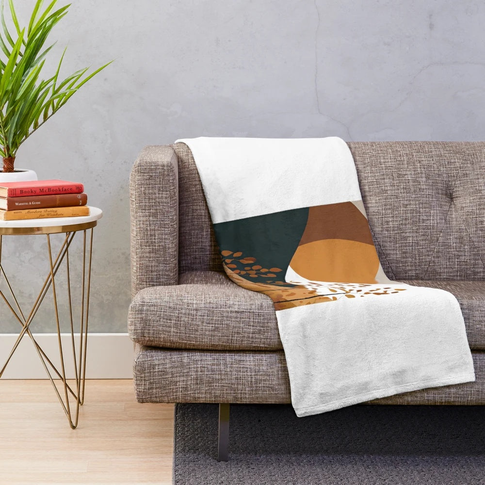Minimalist fall-themed plush blanket with nature and leaf designs