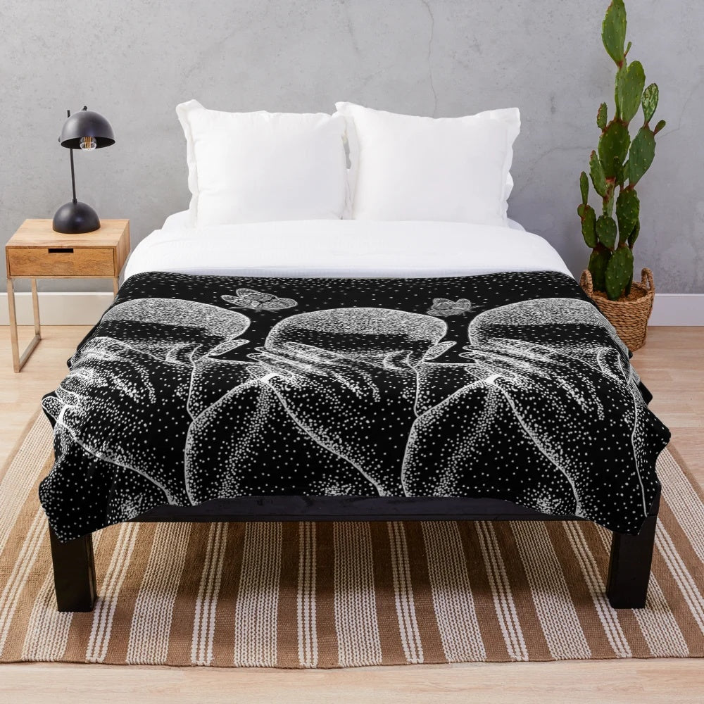 Minimalist black and white plush blanket with a Frank Ocean inspired mandala design