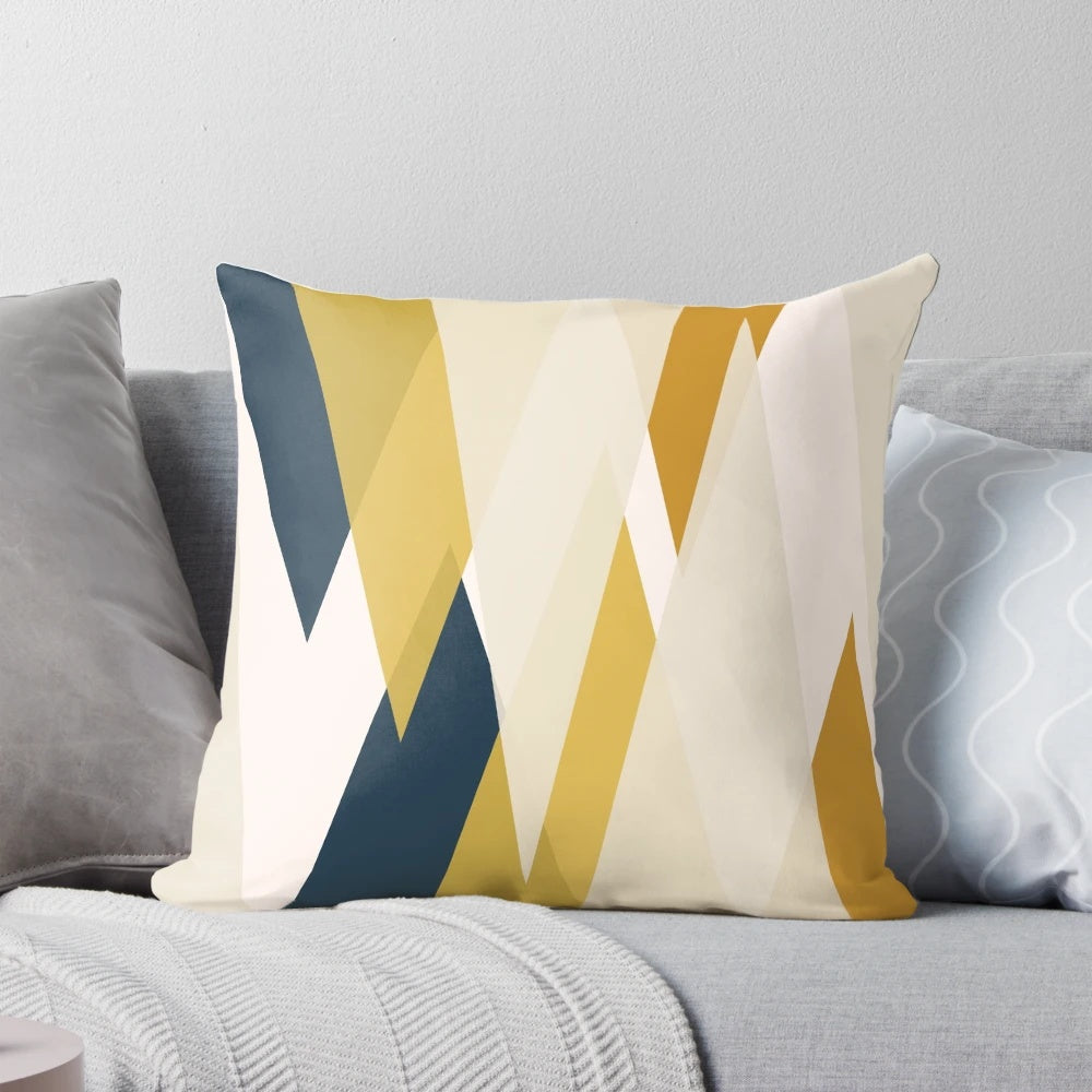 Minimalist geometric abstract throw pillow in mustard, navy, and blush tones
